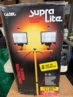Front of Globe Supra Lite box showing product image and branding