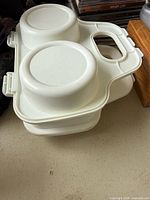White plastic microwave poached egg cooker