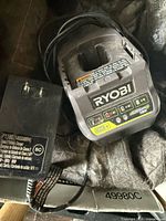 Ryobi charger P118 with accompanying 18V battery