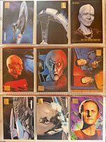 Front view of first nine trading cards page with characters and ships