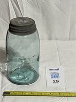 Full view of jar with lid and size reference