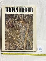 Front of boxed Brian Froud The Elfin Maid 551-piece puzzle with measuring tape for scale