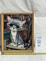 Full view of framed Pity Kitty lithograph with scale ruler