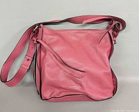Front view of pink Gianni Chiarini leather crossbody bag showing overall design and strap