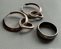 Pair of 925 silver hoop earrings with heart drops and Thai band ring