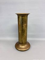 Front view of brass trench art vase