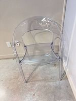 front angled view of clear acrylic armchair