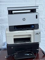 Stack of three printers showing overall appearance