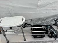 shower chair, crutches, BackJoy cushion