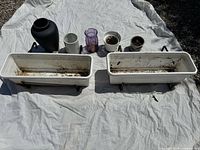 group shot of both planters, five vases and two brackets