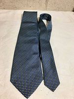Full front view of tie showing overall pattern and color