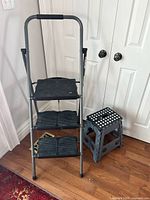 Ladder and stool side-by-side for scale and condition