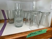 All 12 clear glass tumblers on shelf