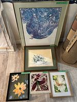 Group shot of all five framed artworks