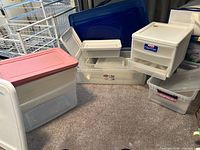 Group shot showing assorted bins, drawers and lids