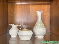 Group shot of vase, creamer and bowl displayed together