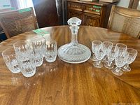 Full set arranged on table: decanter, tumblers, stemmed glasses