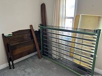 Overall lot showing headboard, footboard, side rails, spring platform and foam topper