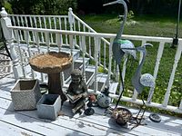 Group view of all garden decor items on deck
