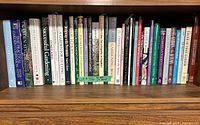 Full shelf view showing all 36 gardening books in lot