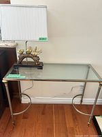 Console table with lamp positioned on top