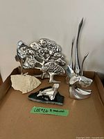 Group view of all eight Hoselton aluminum sculptures