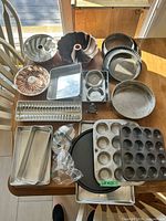 Overall view of all assorted bakeware on table
