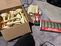 Box containing approx. 10 ivory window candle holders, boxed bubble lights and hardware