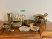 All ten brass items grouped together