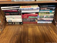 Shelf view showing multiple book spines