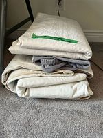 Stacked folded covers showing colors and textures