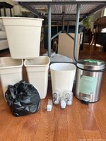Group of bins, trash can, night lights, trash bags