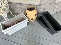 Group shot of all five planters