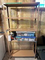 Front view of taller shelving unit with four shelves