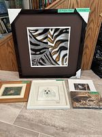 Group shot showing all five artworks with size labels