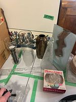 Group showing vases, bronze vase, crackle cone, wave vase, plastic stem holder, boxed flower holder