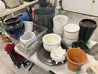 Overall view of assorted planters on table