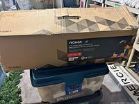 Original carton showing NOMA 6.5' Linden Colour-Changing Tree label