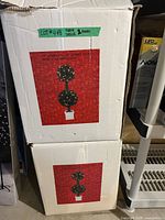 Two original cartons showing product image and details