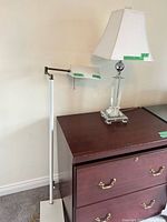 Overview of both lamps beside dresser