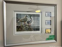 Full view of framed print with stamps and edition number