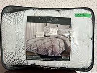 Front view of sealed package showing product image and branding