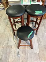Top view of three stools showing seat upholstery