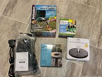 All five boxed/kitted items laid out on floor