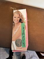 branded Toni Brattin box with hair fibres visible