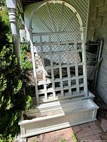 Full view of one planter with attached trellis