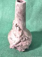 Full view of bronze vase front
