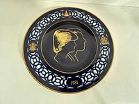Front view shows design, silhouettes, border, date