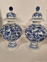 Front view of both ginger jars with lids attached