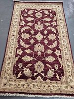 Full view of handmade Sultan Abad design wool rug showing pattern, colors, and fringe